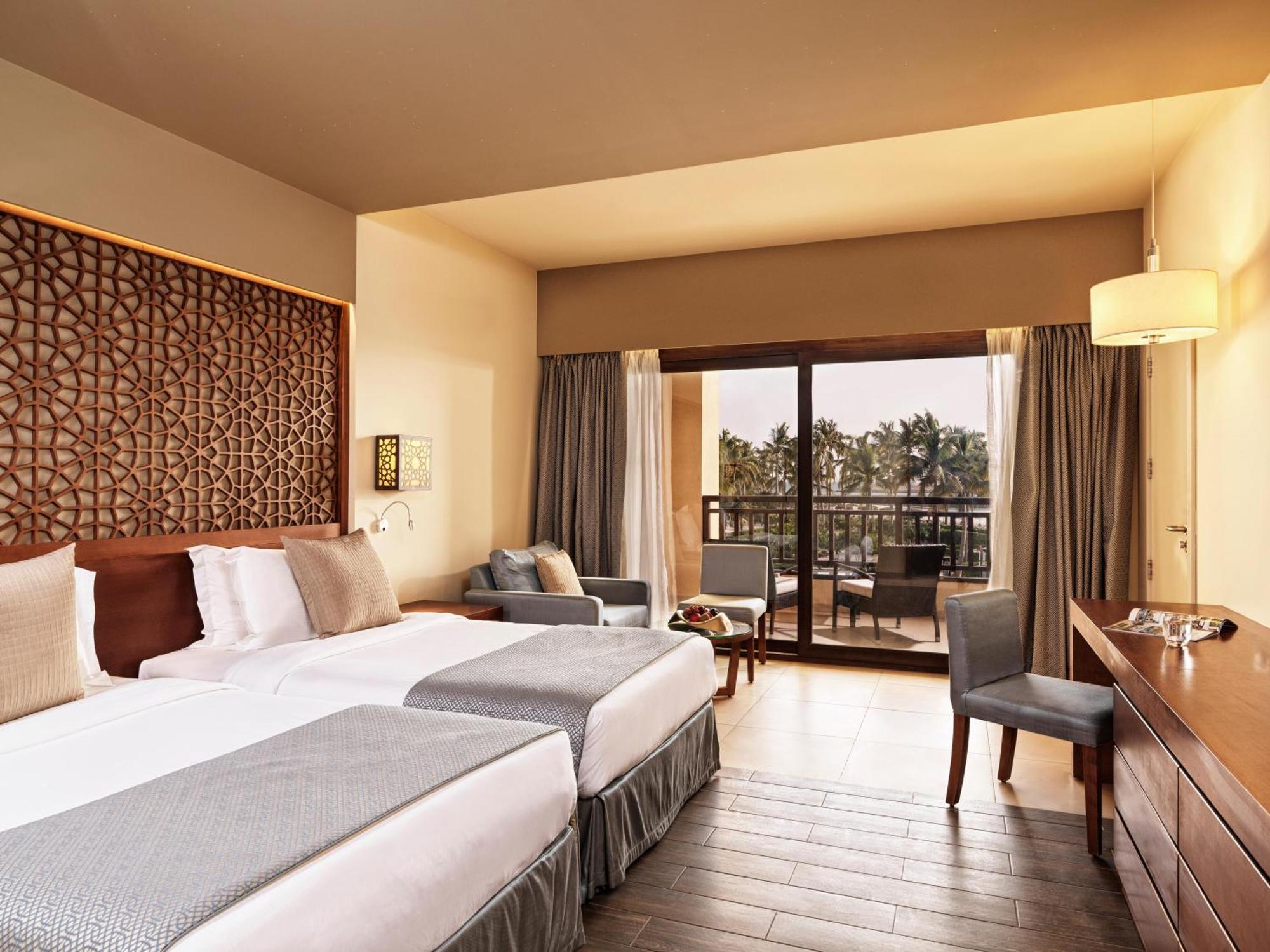 Fanar Hotel & Residences Salalah Extérieur photo A room at the hotel